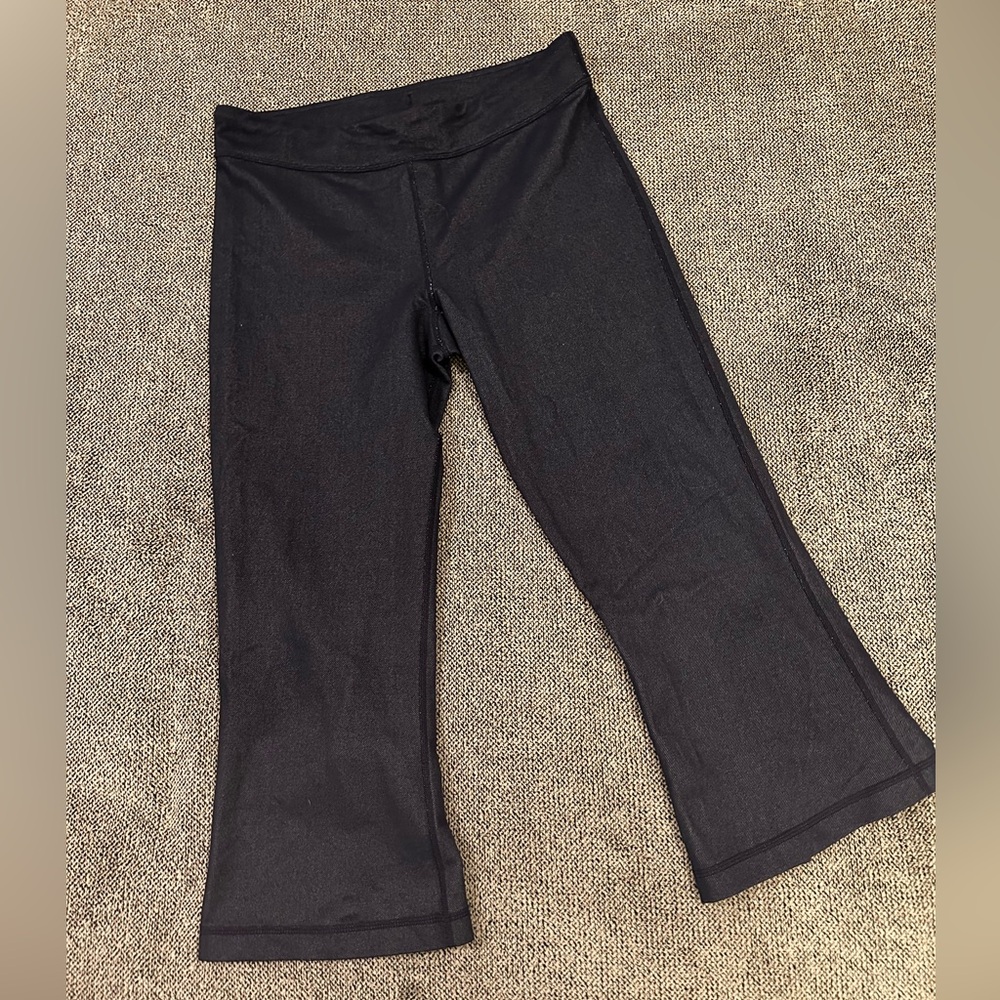 Lululemon cropped, flared, dark blue leggings. Size 6